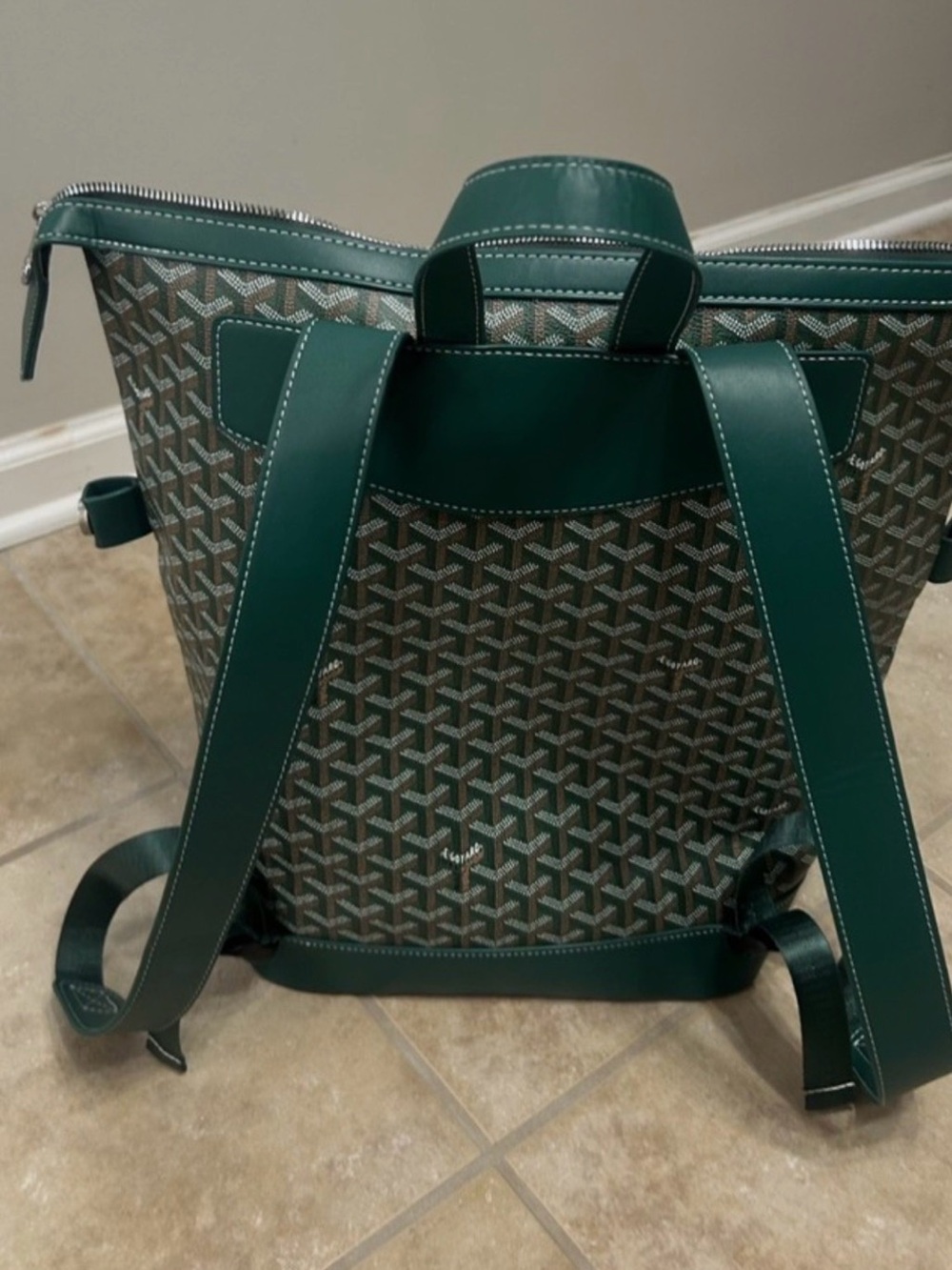 Teal Leather Backpack with Embossed Monogram Detail